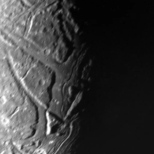 Branching valleys across the surface of Ariel.