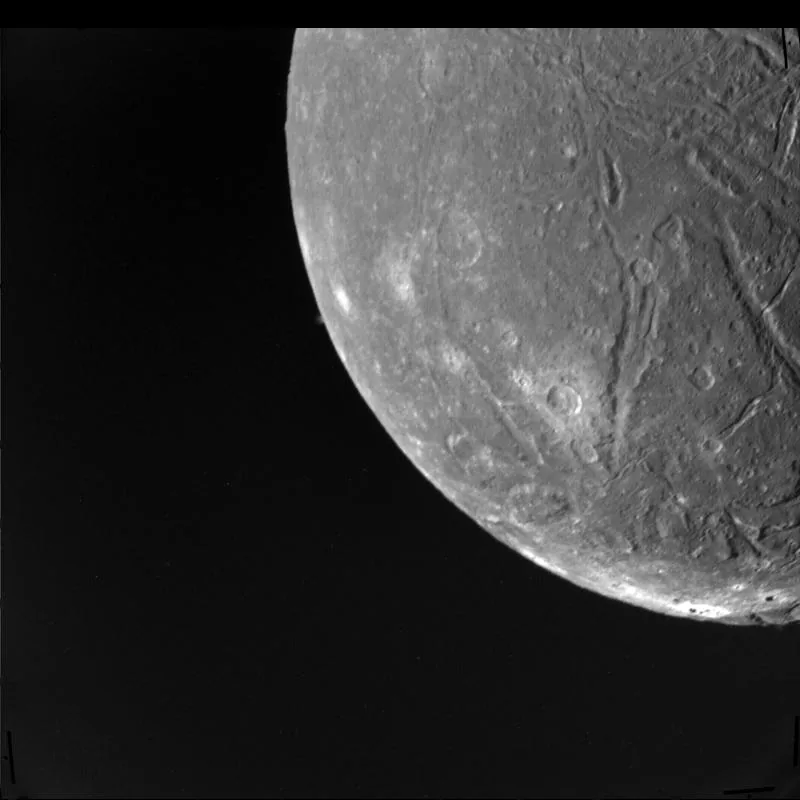 Uranus's moon Ariel and its fault valleys, from Voyager 2.
