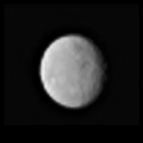 Dwarf planet Ceres and its bright Occator spots, from Dawn.