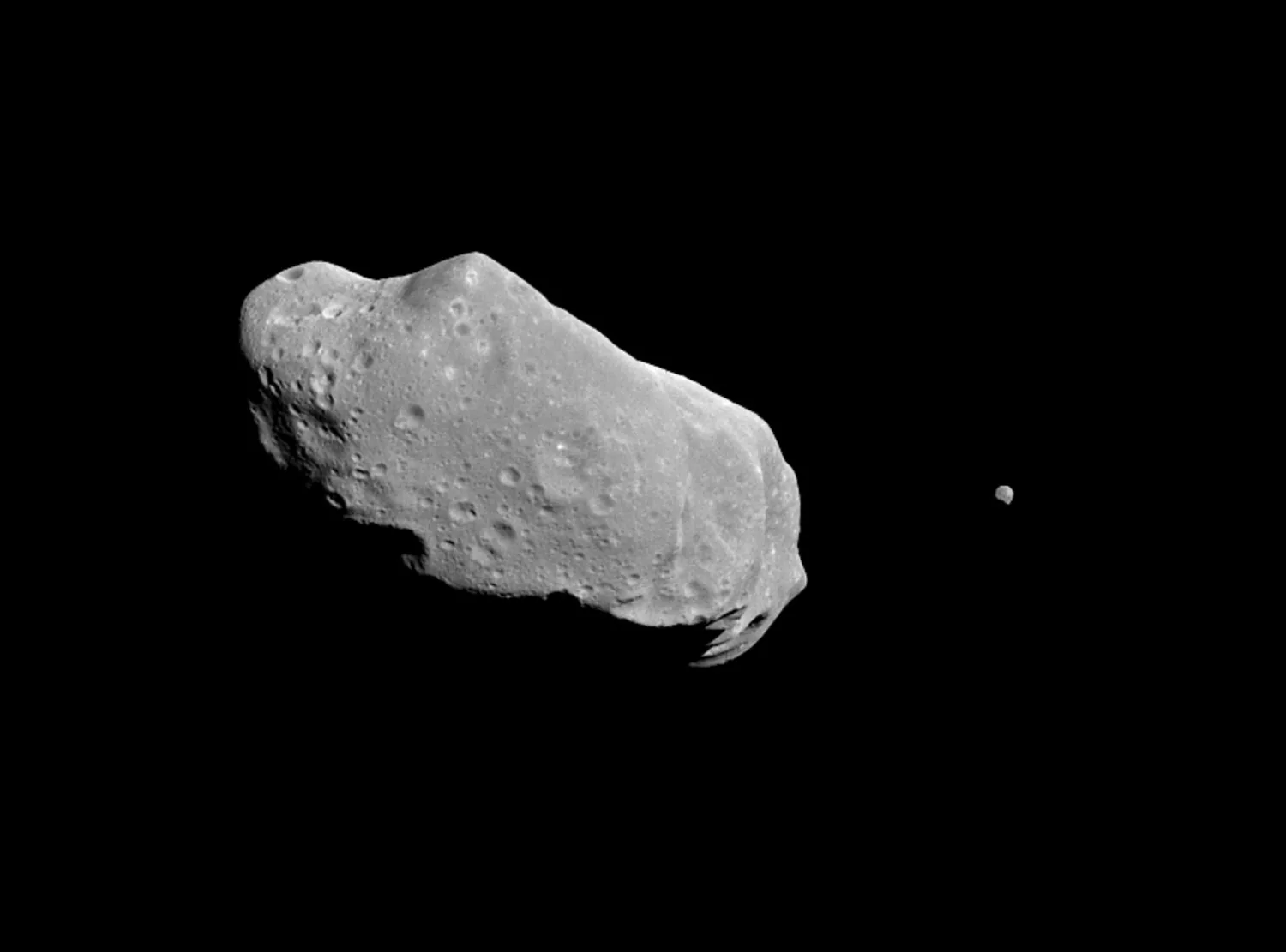 Asteroid 243 Ida and its moon Dactyl u2014 the first asteroid found to have a moon, from Galileo.