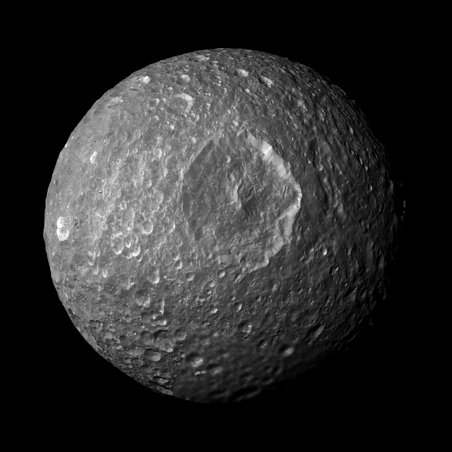 Mimas and its giant Herschel crater, from Cassini.
