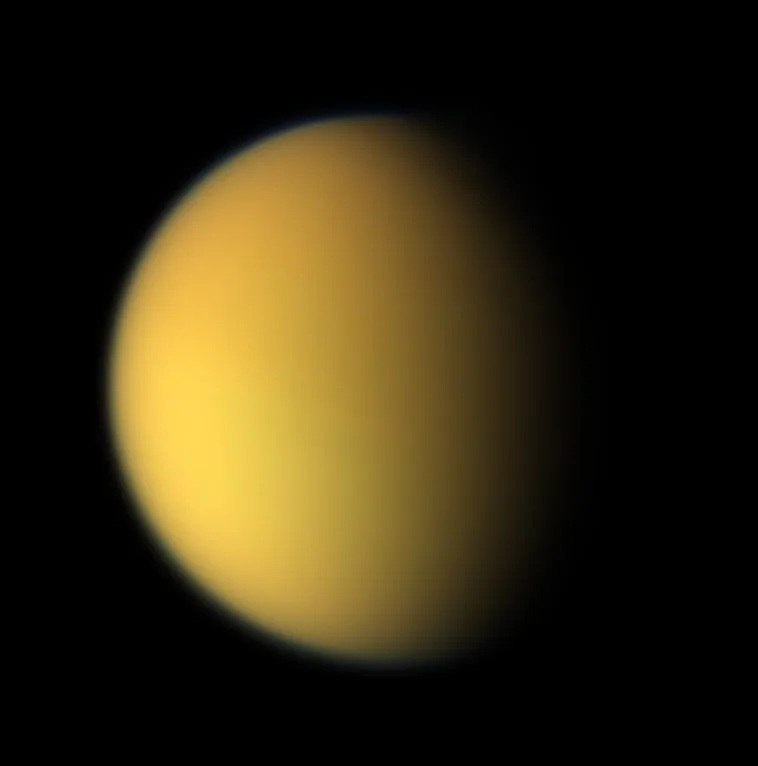 Saturn's largest moon Titan, veiled by its hazy atmosphere, from Cassini.